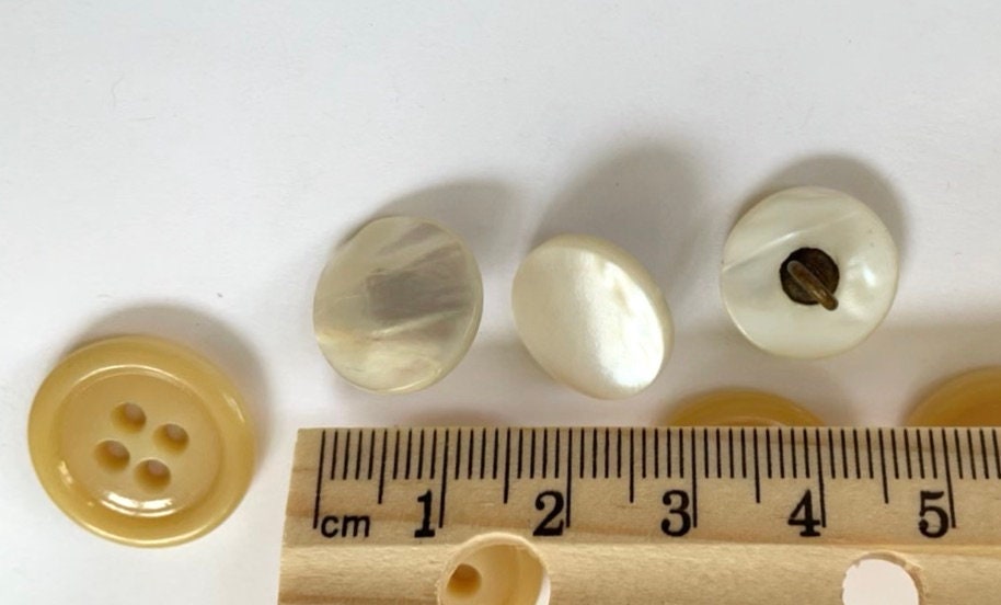 Lot of vintage buttons - from Holland and elsewhere - shades of yellow, gold and cream