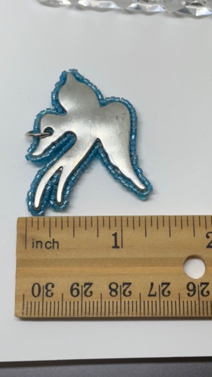 Blue beaded dove necklace pendant