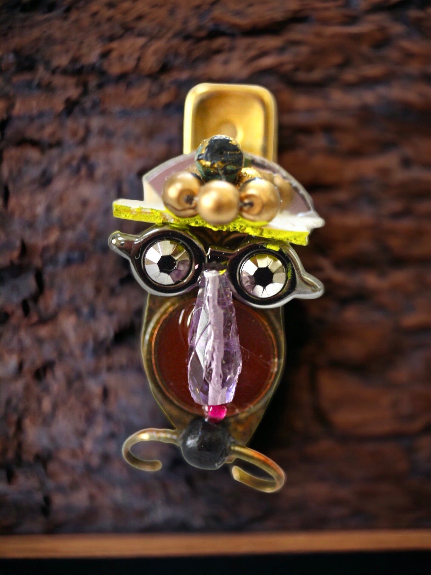 Meet "Henrietta." Henrietta is a really cool assemblage art gal who can be transformed into a necklace, pin, magnet, bottle or little dish