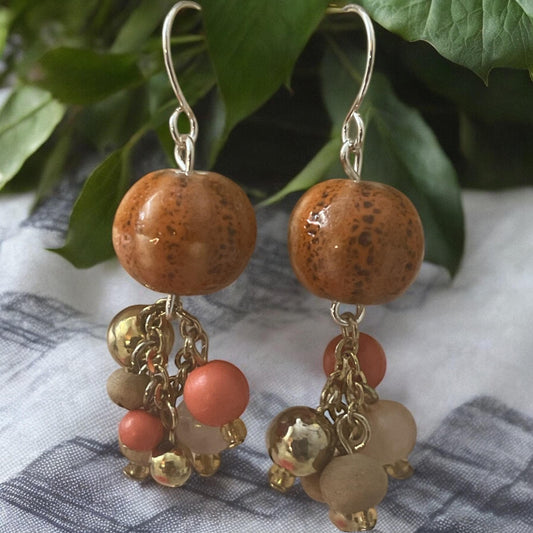 Orange speckled porcelain with mixed color bauble beads handmade dangle earrings