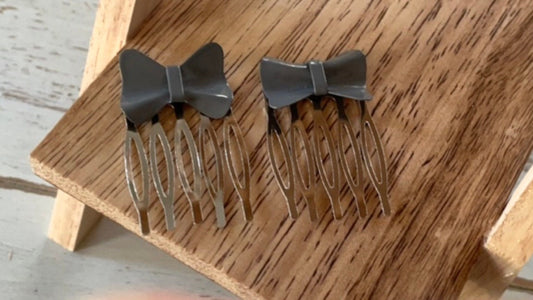 Pair of gray bows mini metal hair combs - 1" each