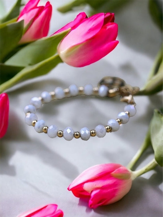 Vintage white faux crystal and goldtone beaded bracelet with unique charm