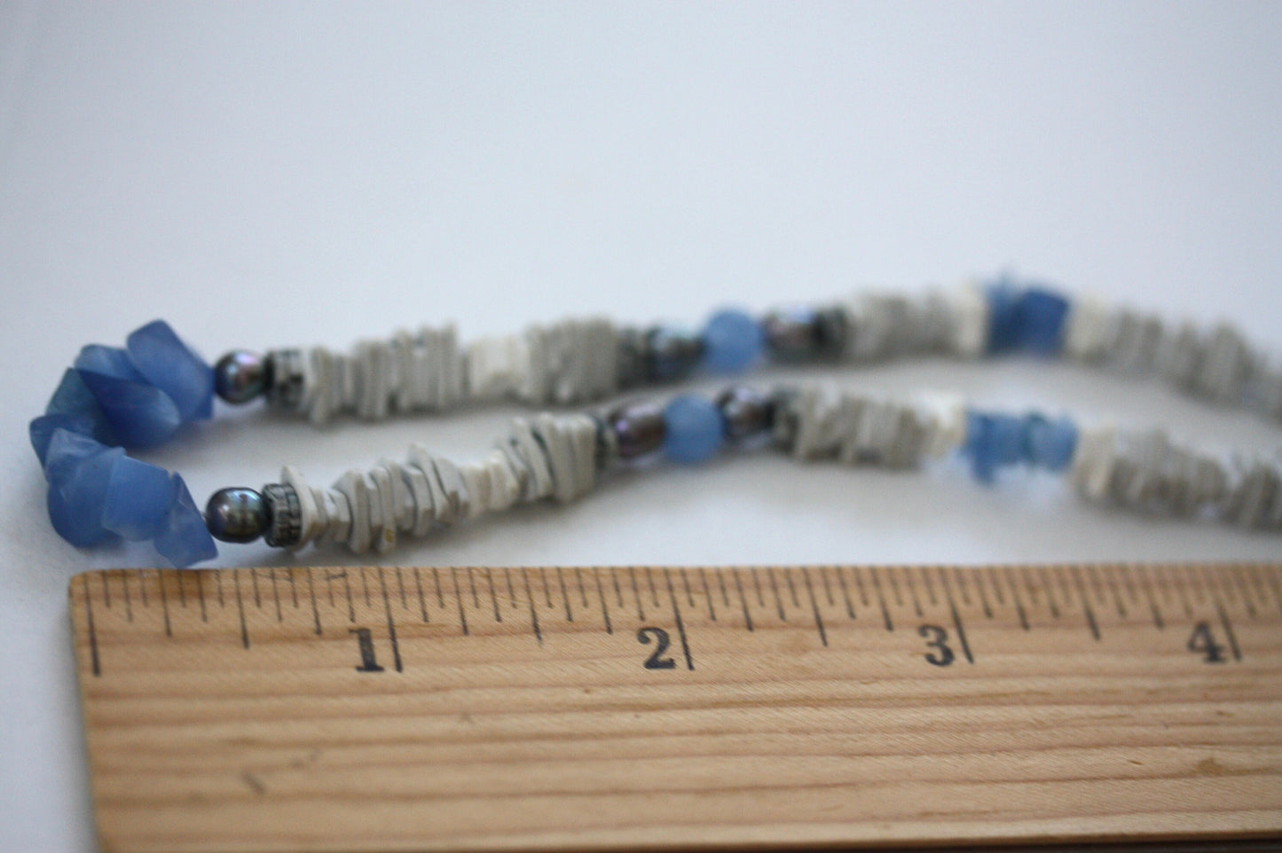 Unique vintage necklace with white shell heishi beads with blue semi precious stone chips