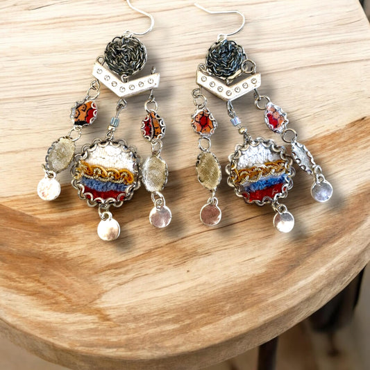 One-of-a-kind earrings made with fabric, velvet, lace, mixed metals, chain and rhinestone studded spacers. Sterling ear wires.