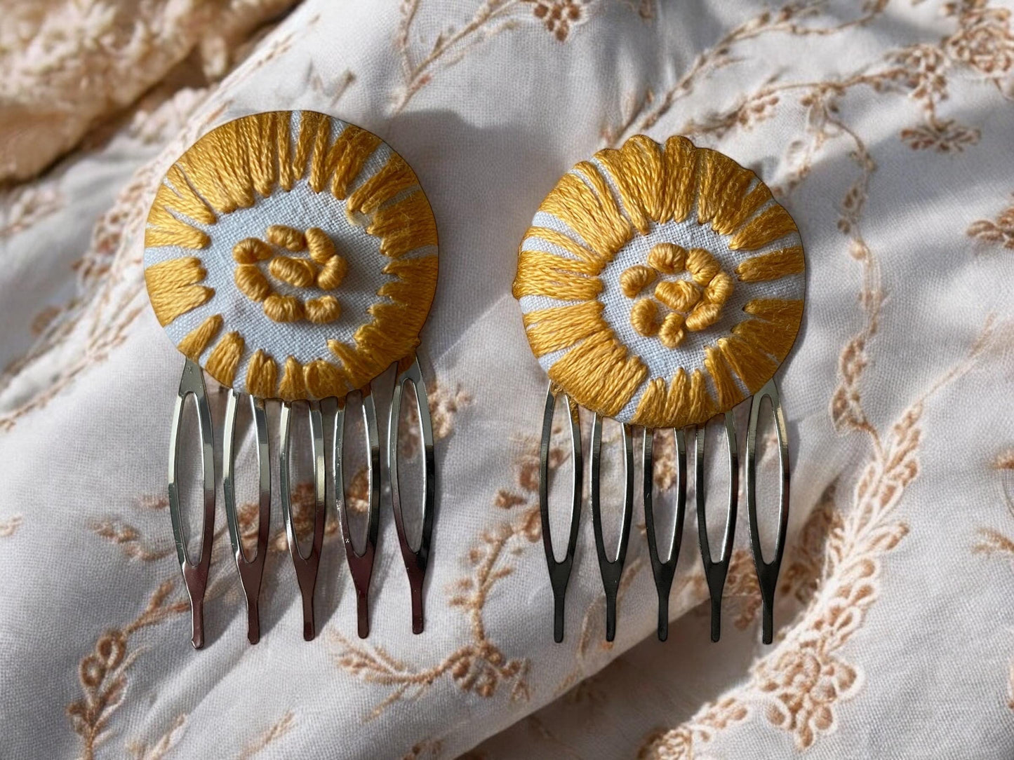 Choice of stud earrings, dangle earrings, hair combs, shanked buttons or pins all hand made from a vintage linen embroidered table runner