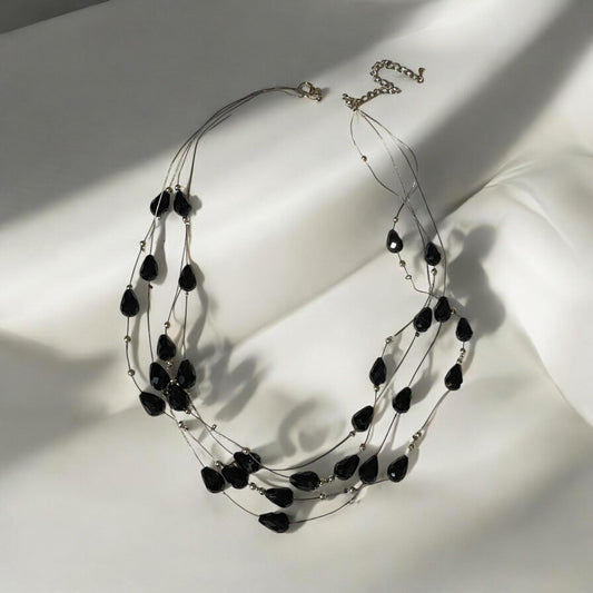 Multi strand black teardrop shaped vintage necklace