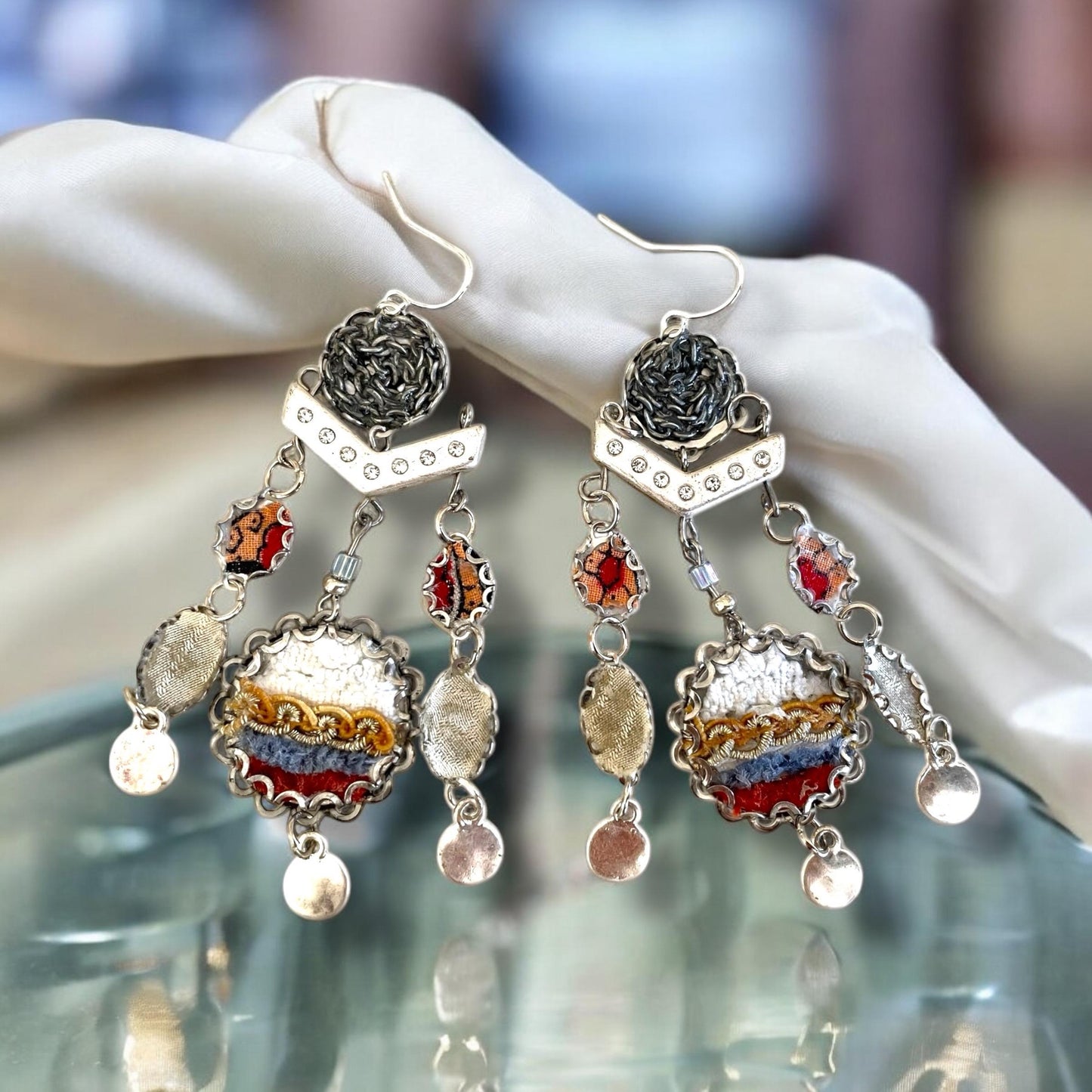 One-of-a-kind earrings made with fabric, velvet, lace, mixed metals, chain and rhinestone studded spacers. Sterling ear wires.