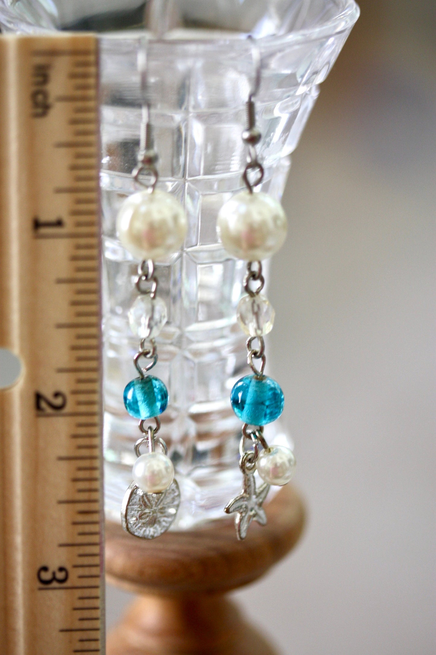 Faux pearl, clear crystal and recovered blue vintage glass dangle earrings with starfish and silver dollar metal shell
