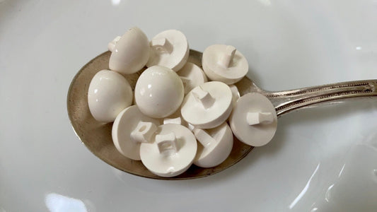 Lot of white domed top vintage buttons