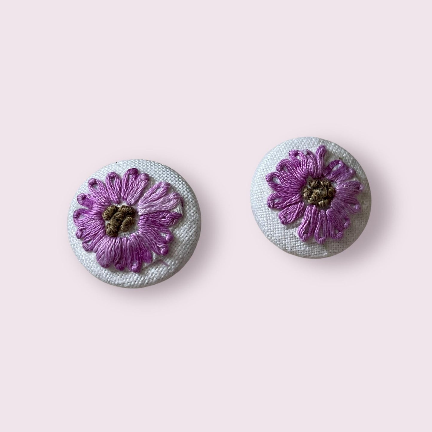 Choice of stud earrings, dangle earrings, hair combs, shanked buttons or pins all handmade from a vintage linen embroidered table runner: