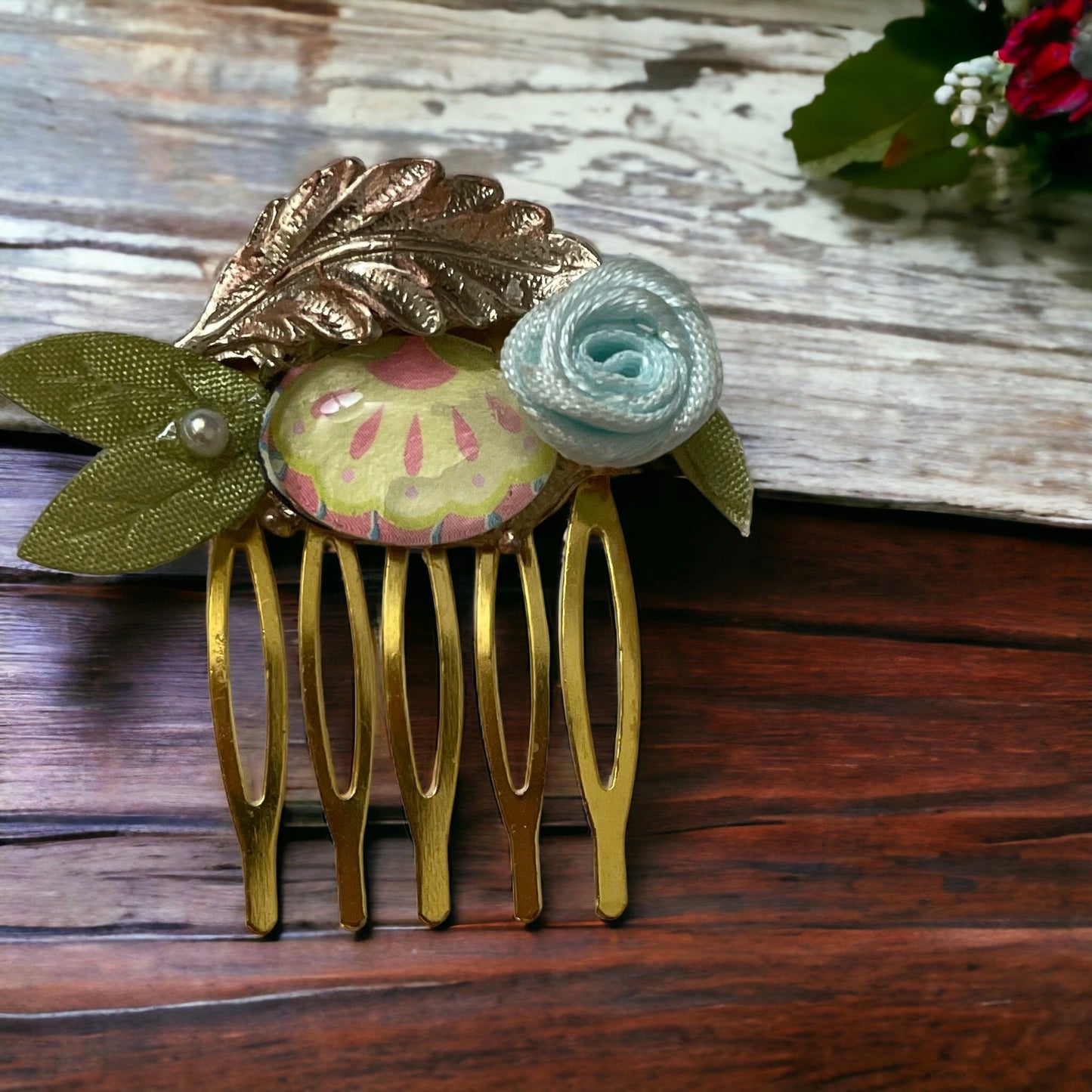 Garden inspired mixed material small 1" hair comb with antiqued metal leaf, paper sealed glass cabochon, satin flower/leaves