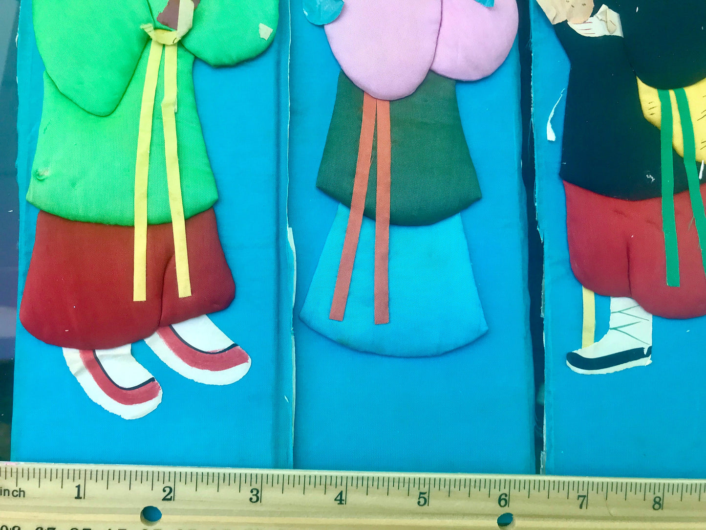 Your choice of unique colorful satin Asian panels - 11" long x 3" wide.