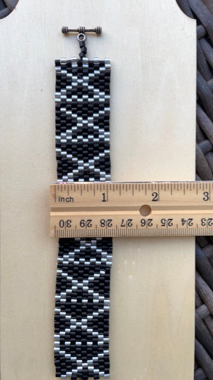 Stunning vintage silver and black hand woven vintage beadwork bracelet