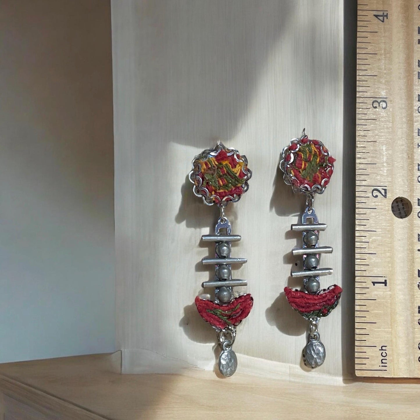 Red, yellow and olive green mixed media collage earrings with fabric, thread, mixed metals and hammered drops; Sterling silver ear wires