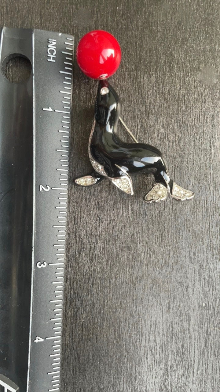 Stunning Vintage Kenneth Jay Lane (KJL) Figural Seal Brooch Black Enamel with Rhinestones and red ball