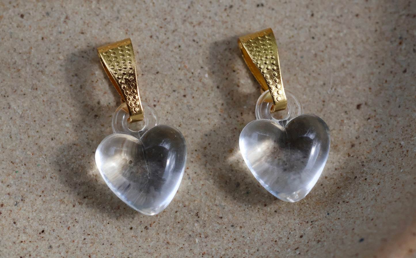 One dozen clear heart pendants - can be used as necklace pendants or for making earrings