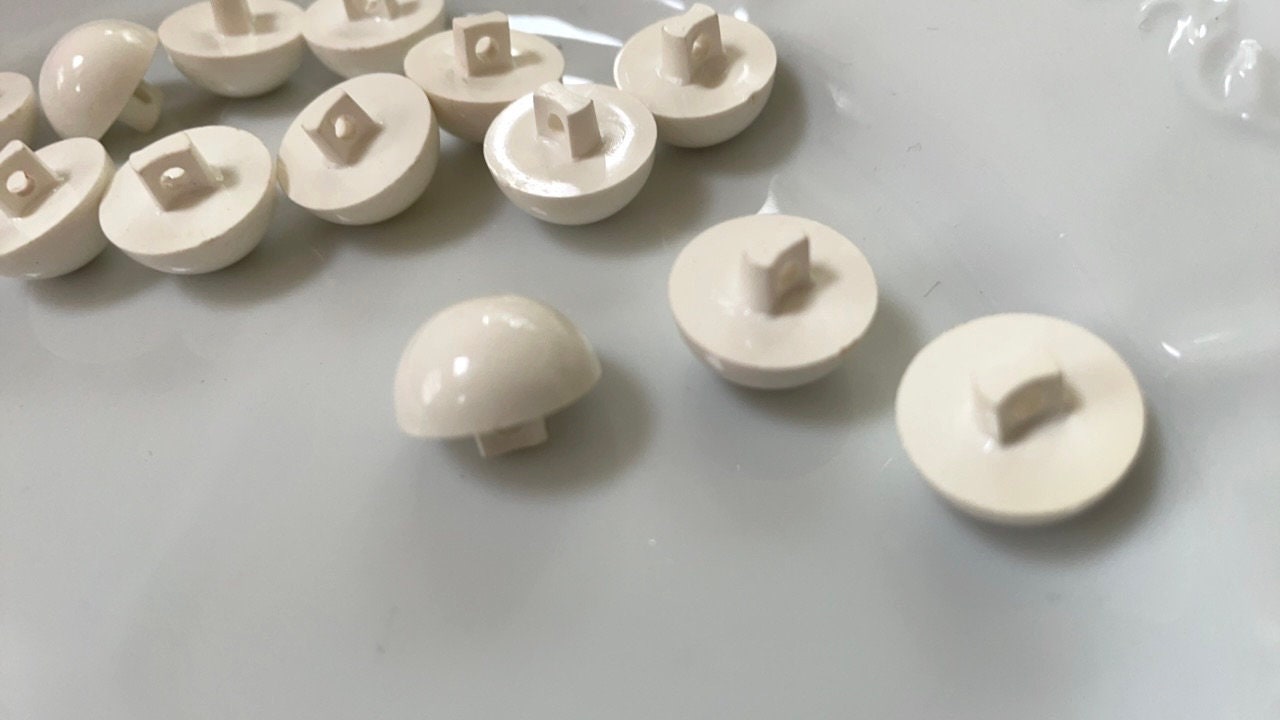 Lot of white domed top vintage buttons