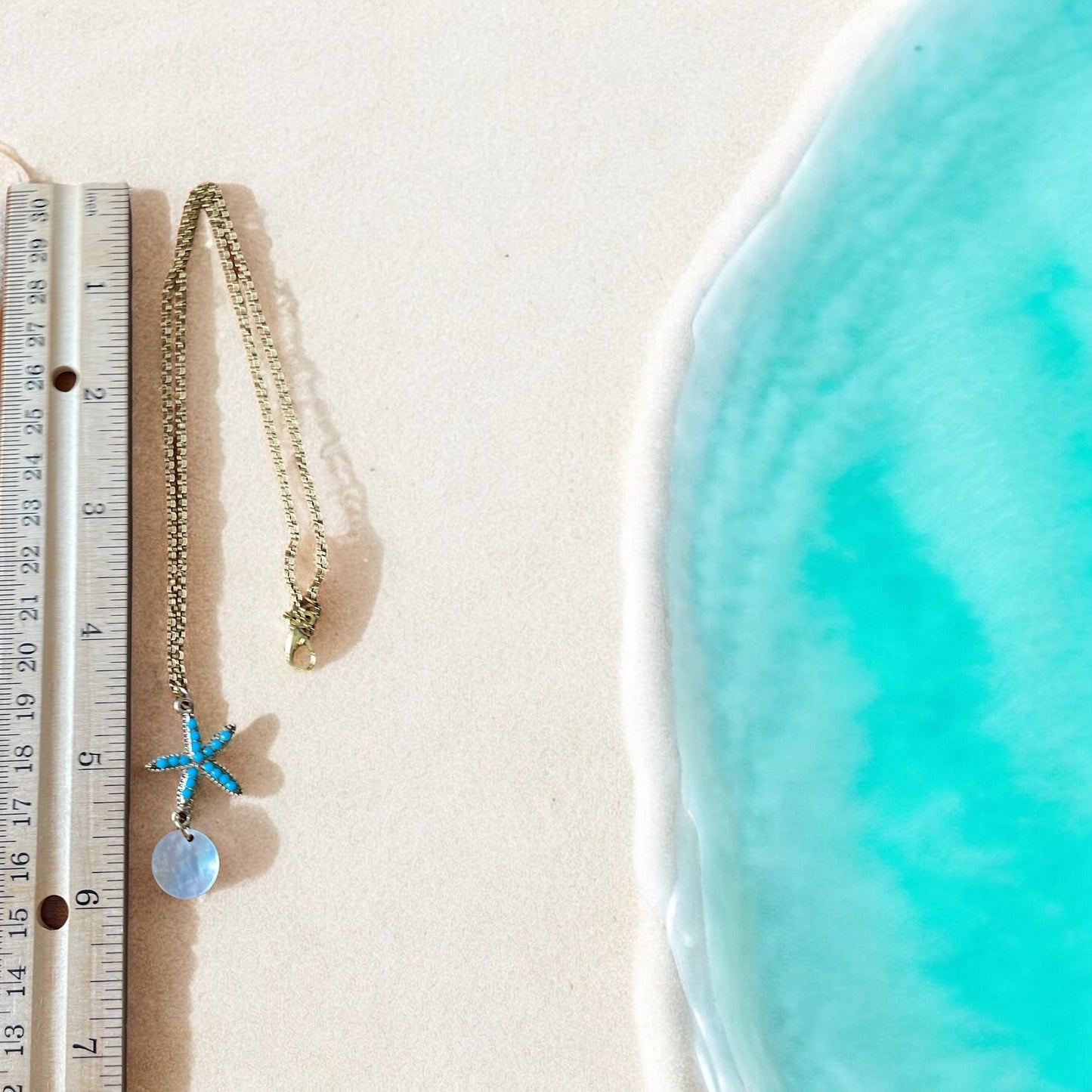 Stunning blue beaded starfish and mother of pearl necklace and earring set