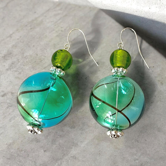 Shades of green and blue blown glass dangle earrings
