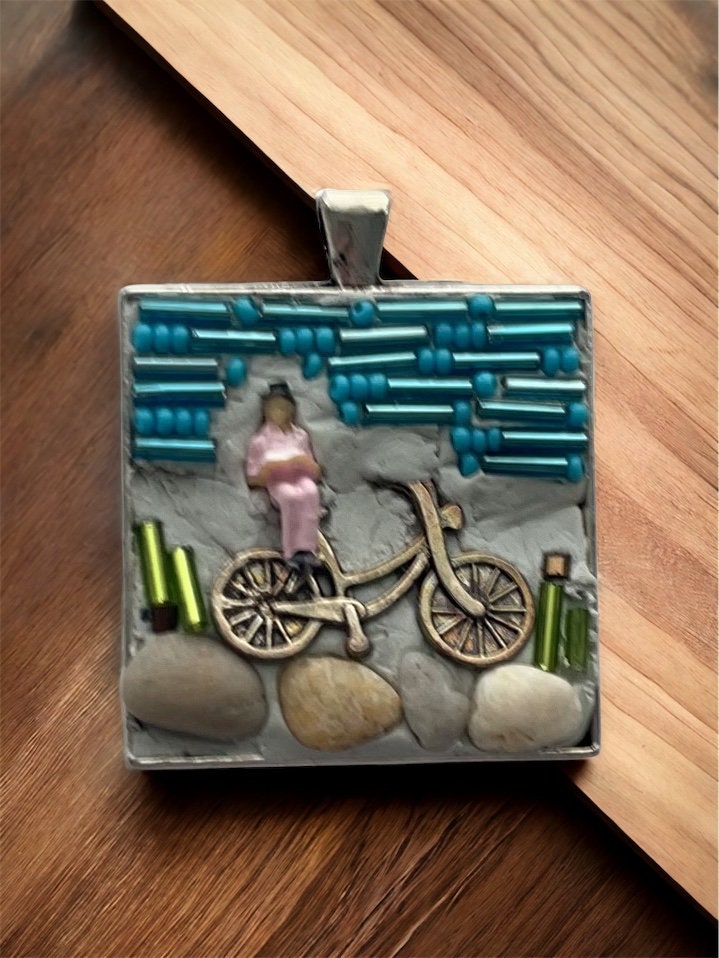 My own handmade micro mosaic mixed material collage necklace - woman resting on her bicycle