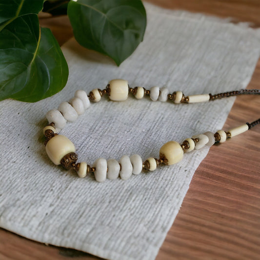 Unique vintage necklace - drilled stones, metal spacers and horn style varied shaped beads