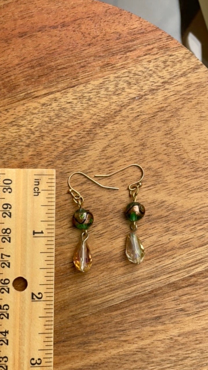 Handmade dangle earrings with green and gold art glass and faceted crystals