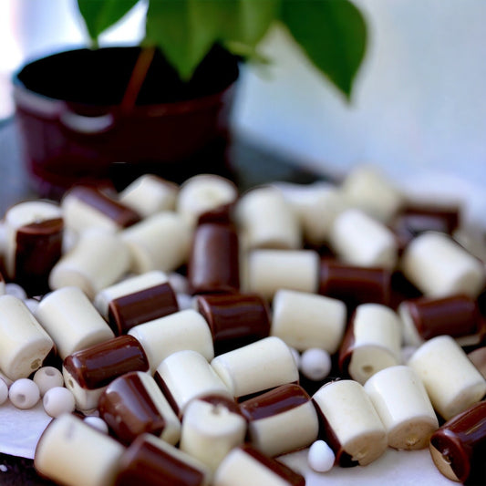 One dozen unique half brown, half creamy white vintage beads