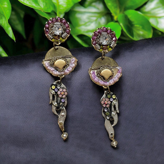 Handmade shades of lavender & purple mixed media earrings made with glass beads, crystals, chain, metal and other upcycled mixed materials