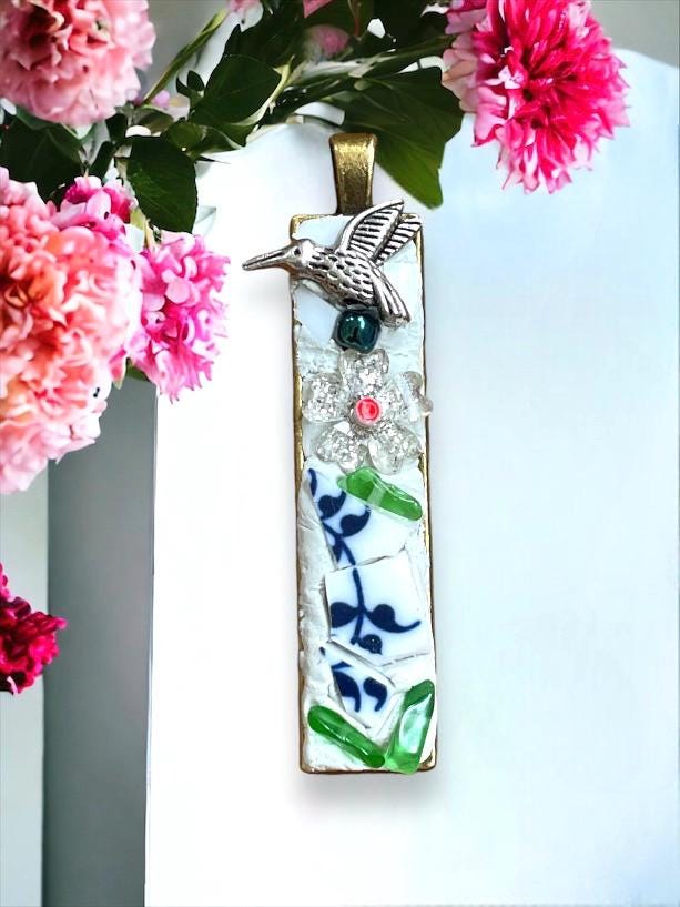 Handmade inlaid mixed material mosaic necklace - bird on a flower - tile from vintage plates, metal, glass chips, millefiori
