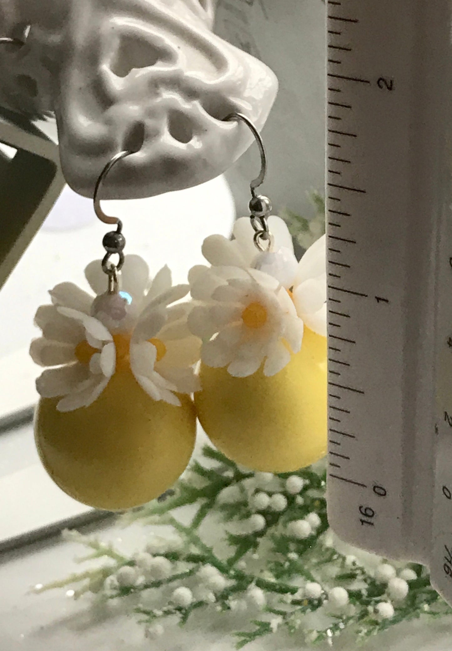 Bring the happy into your day with these flowery happy earrings