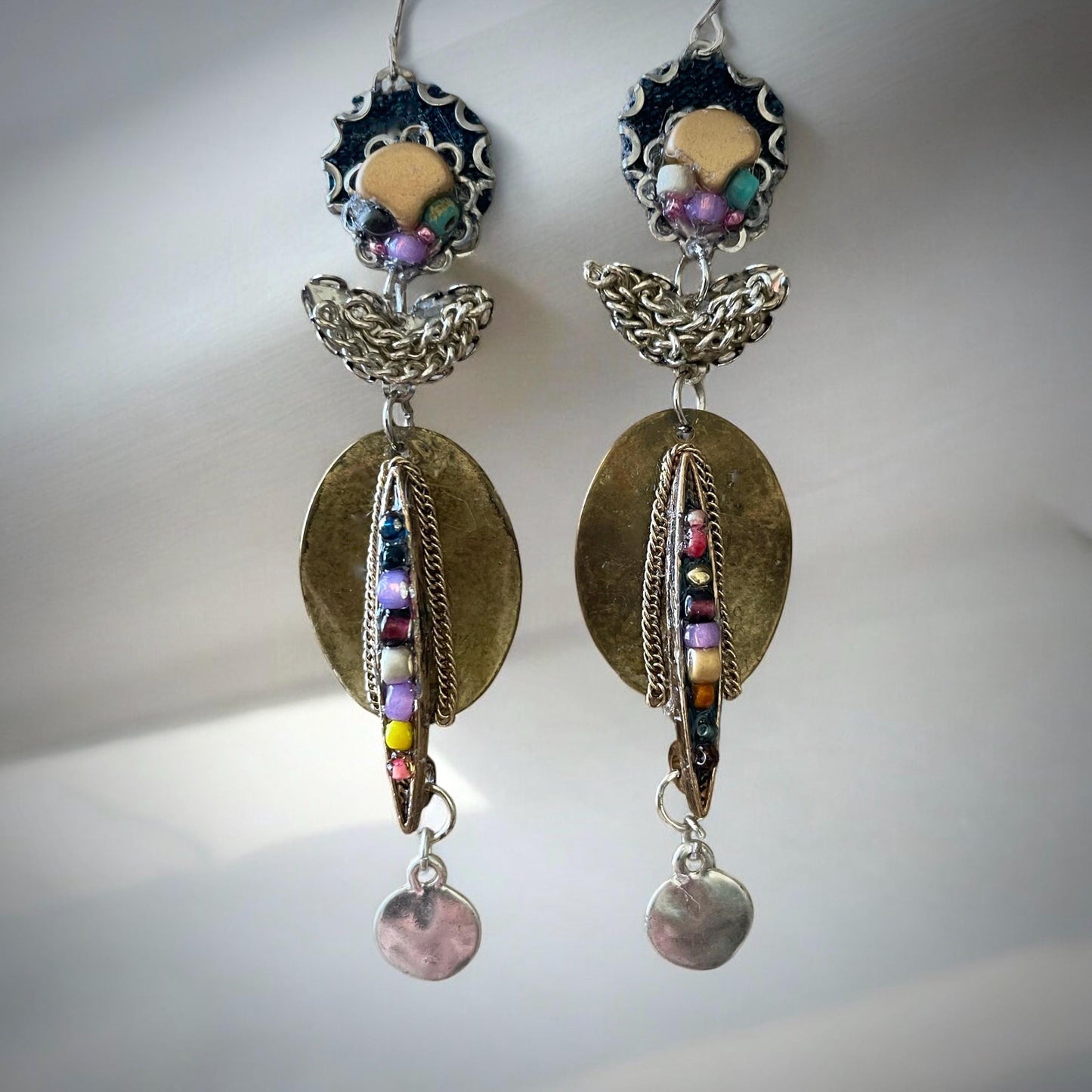 Handmade mixed media earrings made with copper, glass, denim, varied tones of chain and mixed metals, sterling silver ear wires