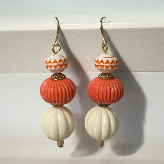 Orange & cream dangle earrings - vintage bead with orange motif combined with cream and orange colored vintage melon ball beads