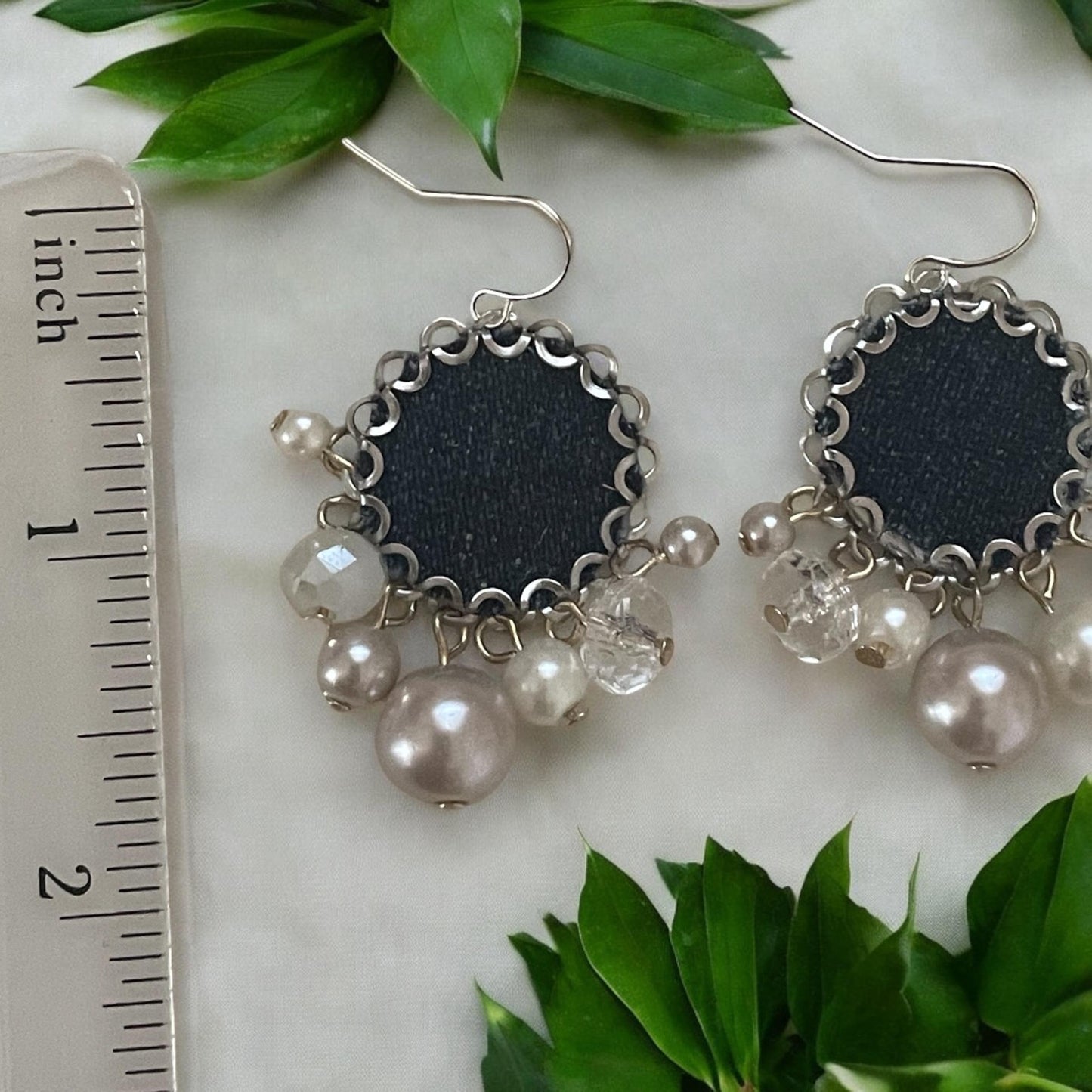 Unique dangle earrings made with denim, crystals and faux pearl dangles. Sterling silver ear wires.