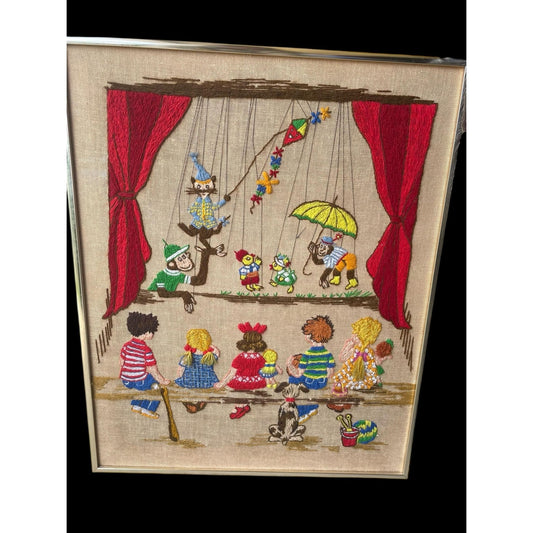 Rare vintage framed finished crewel needlepoint - kids with dog watching a puppet show