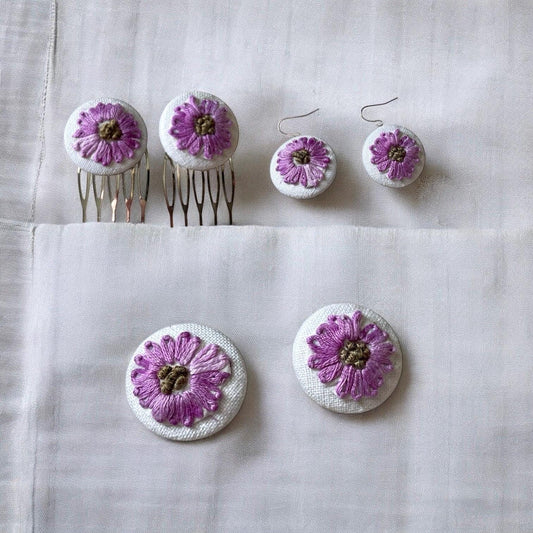 Choice of stud earrings, dangle earrings, hair combs, shanked buttons or pins all handmade from a vintage linen embroidered table runner:
