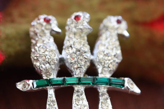 Stunning vintage pin - 3 rhinestone studded birds on a green crystal baguette branch