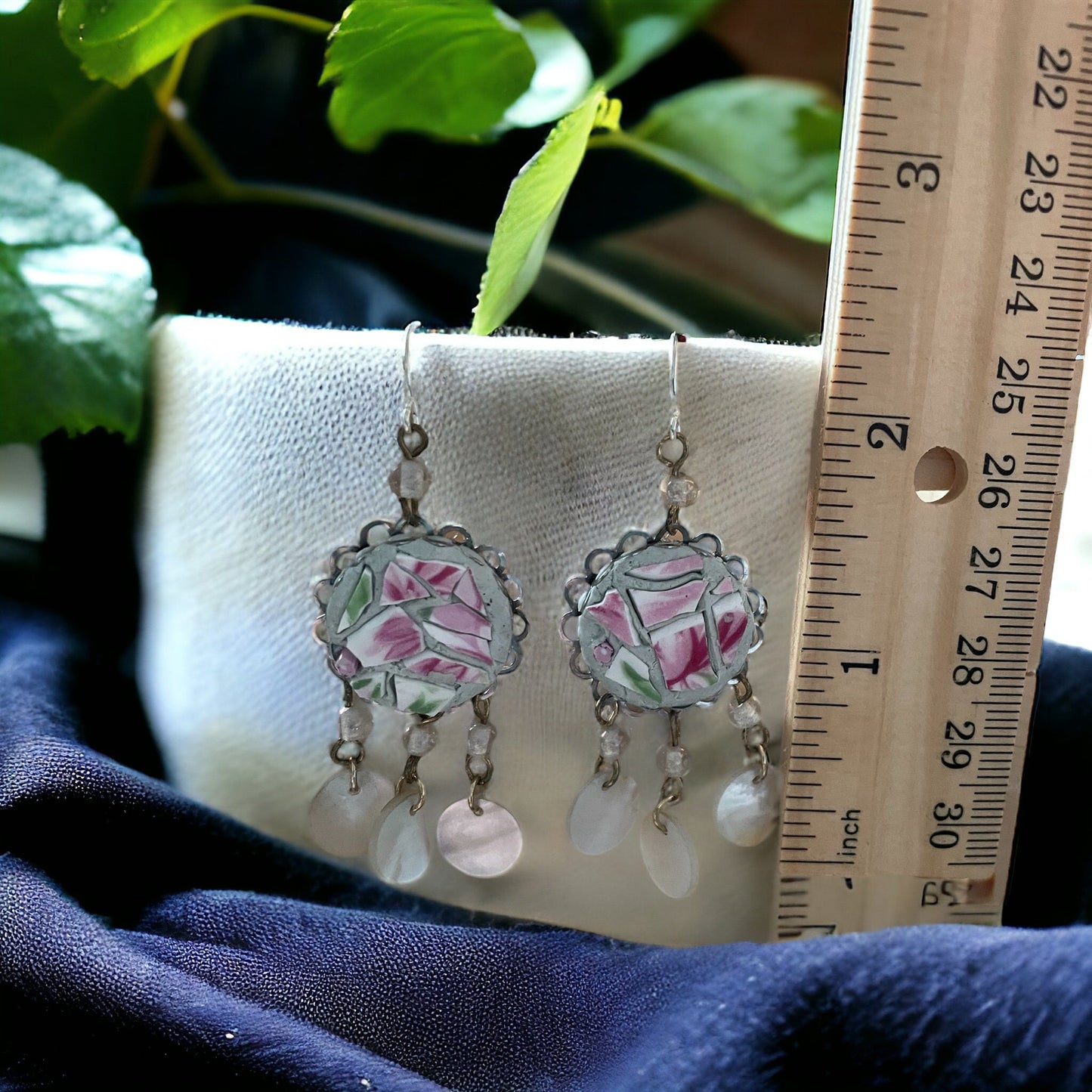 Unique earrings made of hand cut mosaic tile from vintage plates combined with mother of pearl dangles