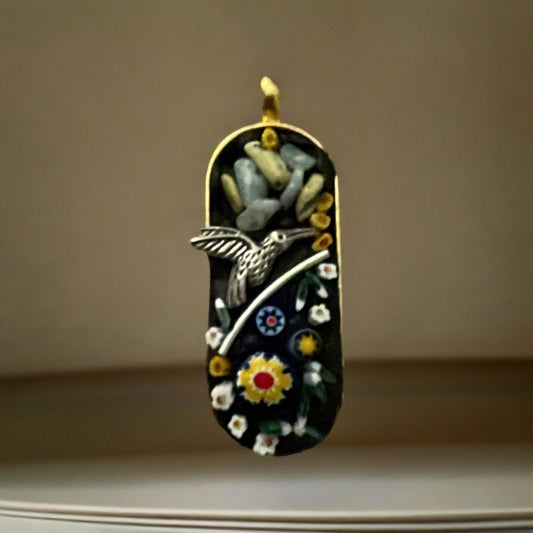 My handmade mosaic necklace - mixed material pendant with semi precious stones, millefiori glass and metal - comes on a matching chain