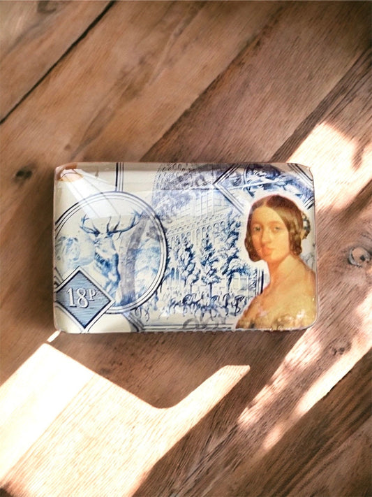 Necklace pendant or pin made from a genuine vintage postage stamp from Victorian Britain featuring Queen Victoria