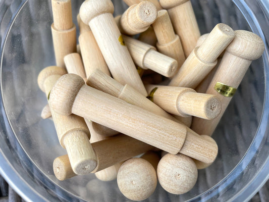 Unfinished solid wood pegs - great as craft supplies - for coat racks, doll making, wood sculptures, mixed material projects, etc.