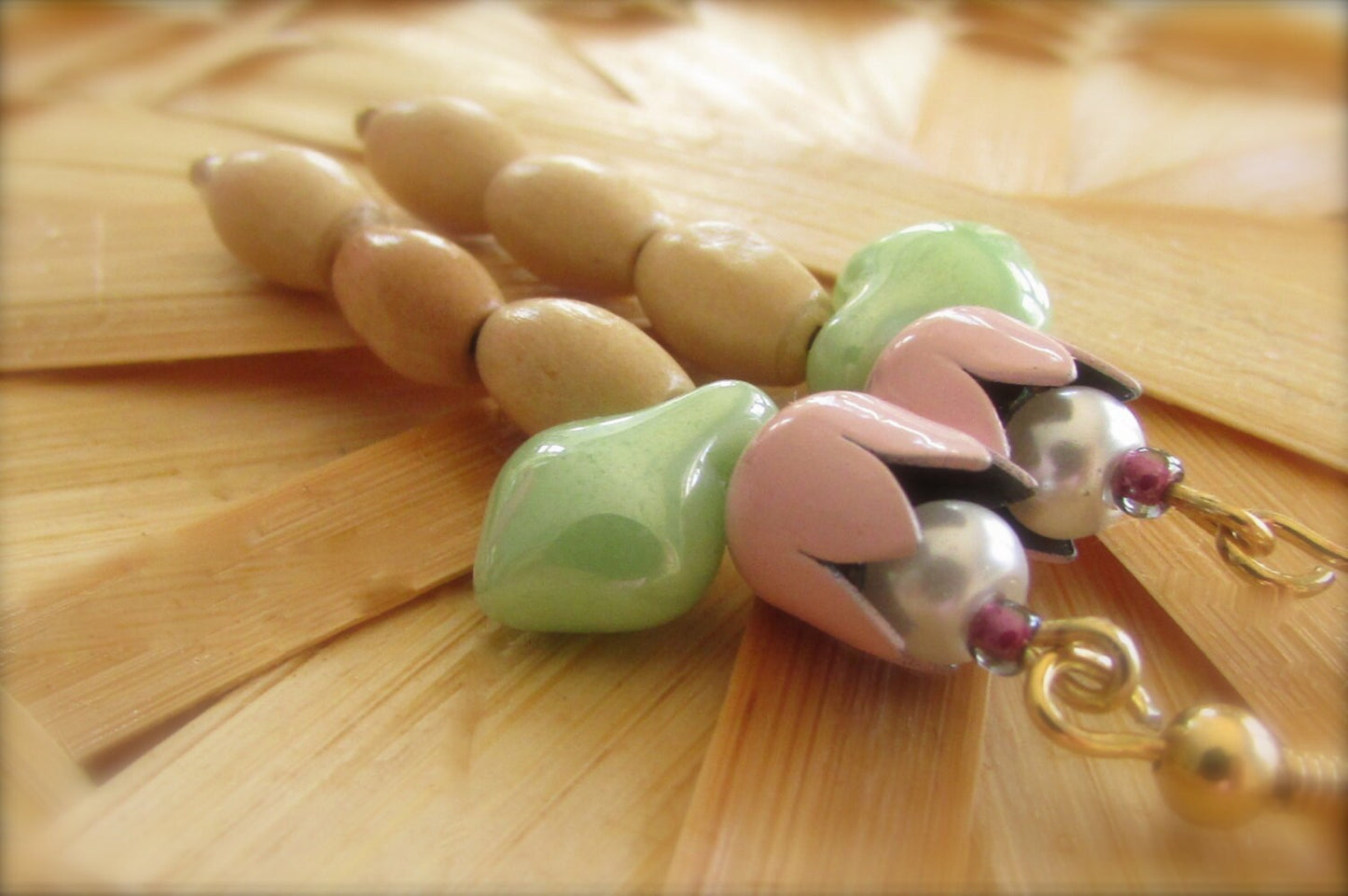 Handmade pink tulip earrings with wood oval puff beads pink enamel tulips, glass leaves and faux pearl centers