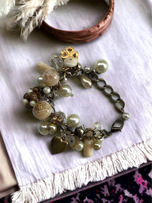 Vintage charm bracelet - faux pearls, glass, crystals, buttons and mixed materials