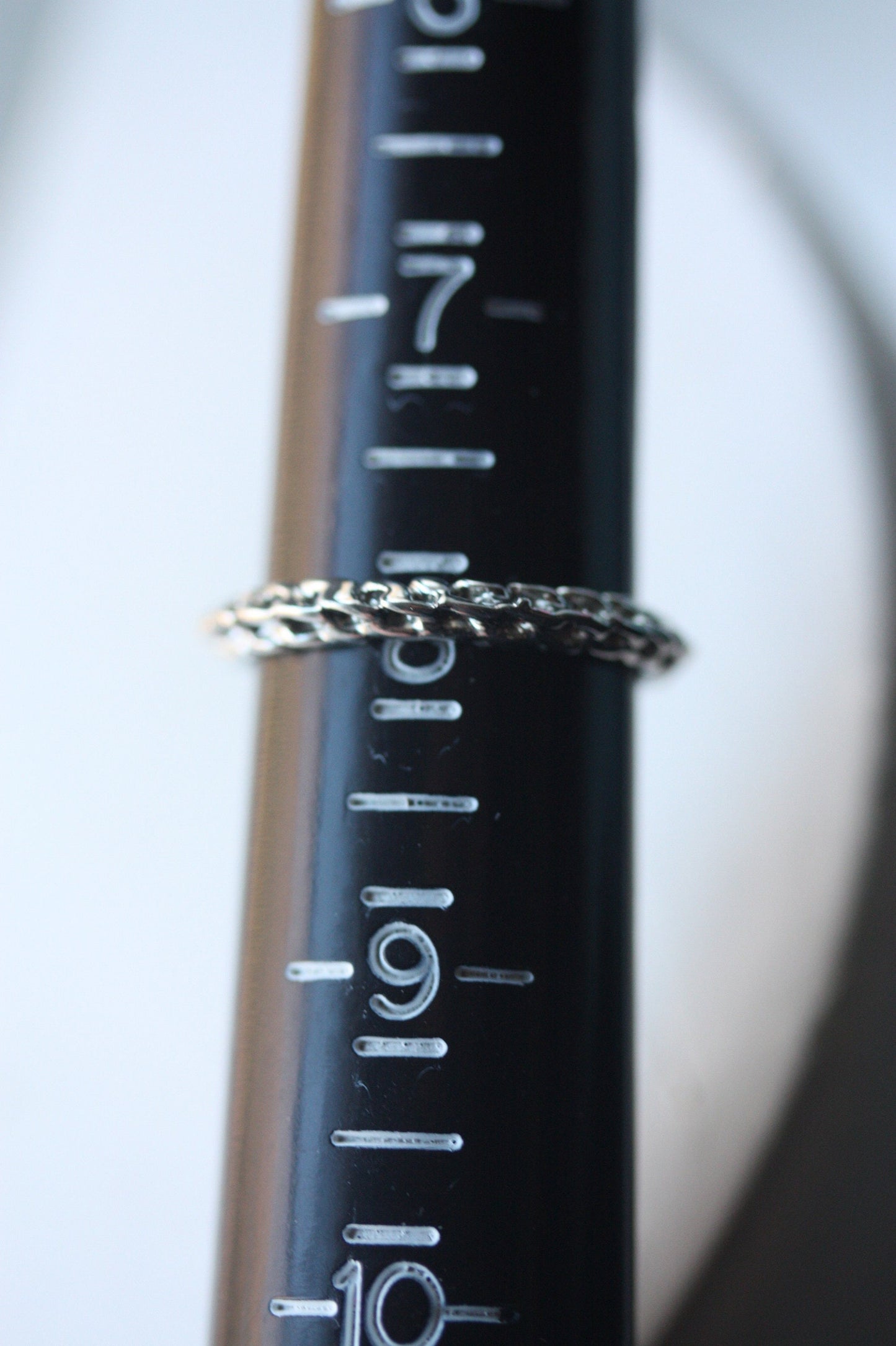 Stunning vintage costume ring - braided silvertone metal