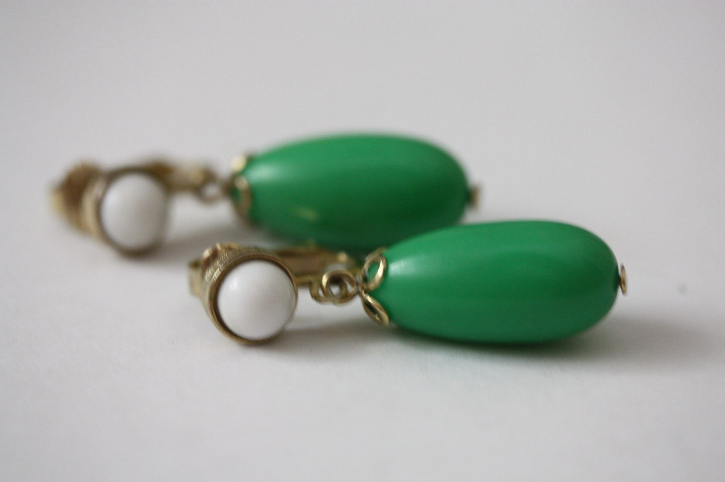Green and white vintage Avon clip on dangle earrings