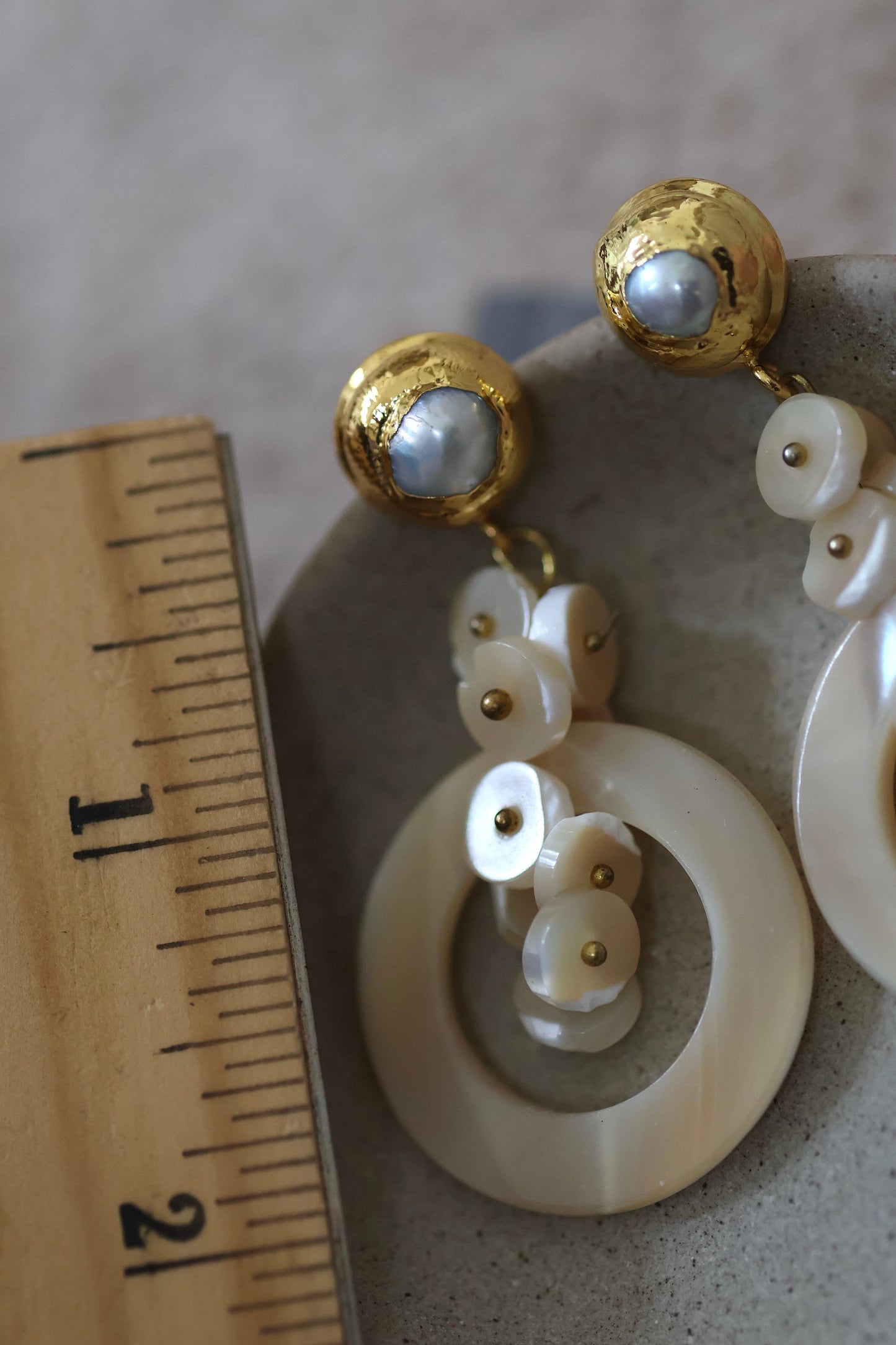 Very unique cream colored mother of pearl shell rounded hoop dangle earrings