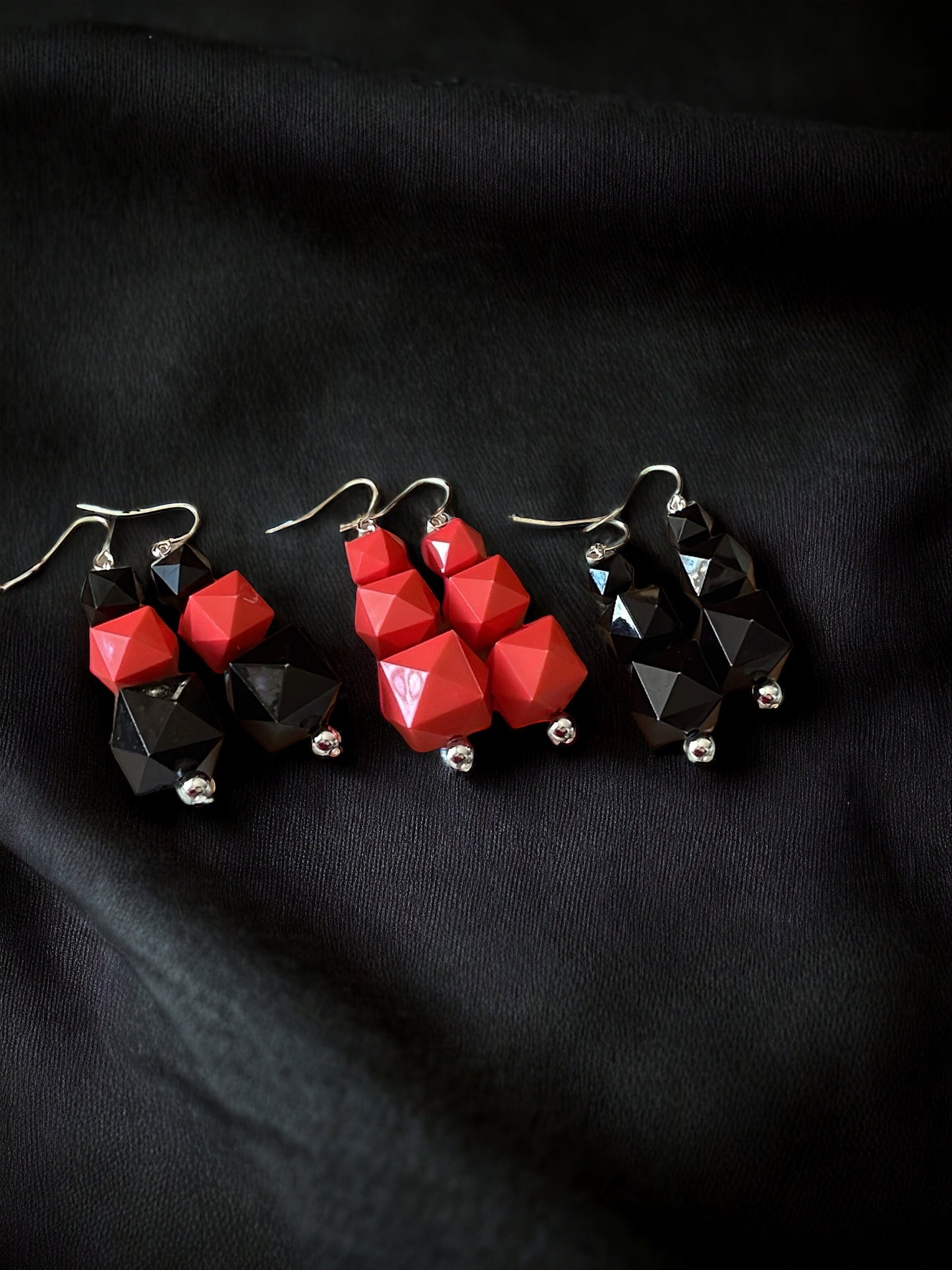 Your choice of coral or black faceted dangle earrings