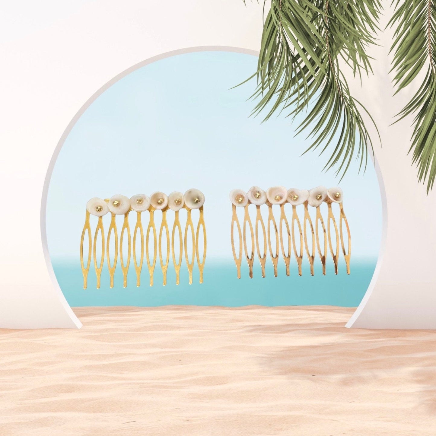 Pair of ivory white shell hair combs with goldtone centers