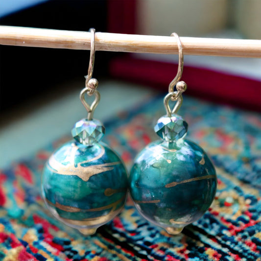 Dangle earrings made of turquoise rondelle crystals and unique turquoise/gold swirled upcycled vintage beads