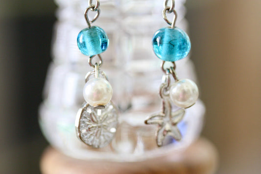 Faux pearl, clear crystal and recovered blue vintage glass dangle earrings with starfish and silver dollar metal shell