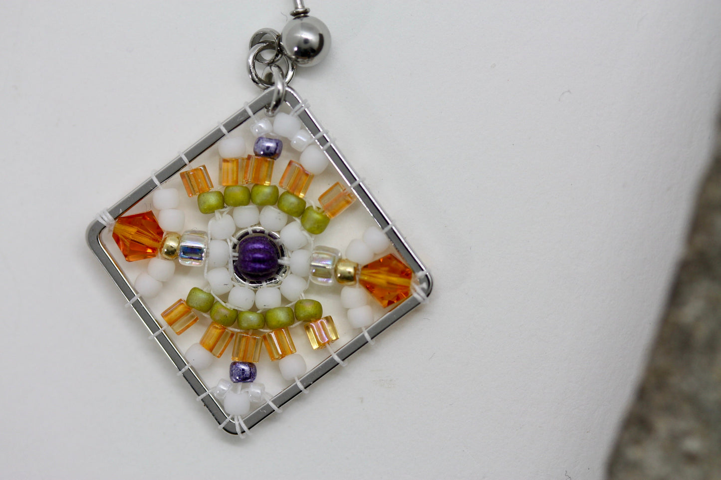 Orange, green, purple and white crystal and intricate beadwork small square dangle earrings